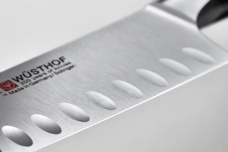 Cuchillo alveolado cocinero japonés 17 cm Classic Ikon Forjado
